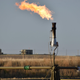 A flare, which burns excess gas, including methane, at a well pad in North Dakota.
